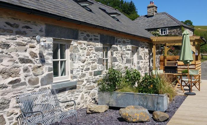 The outside of Star with outdoor seating area and kitchen.